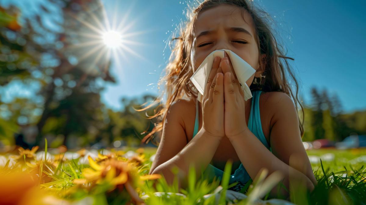 sick-kid-blowing-their-snot-into-tissue_75739900