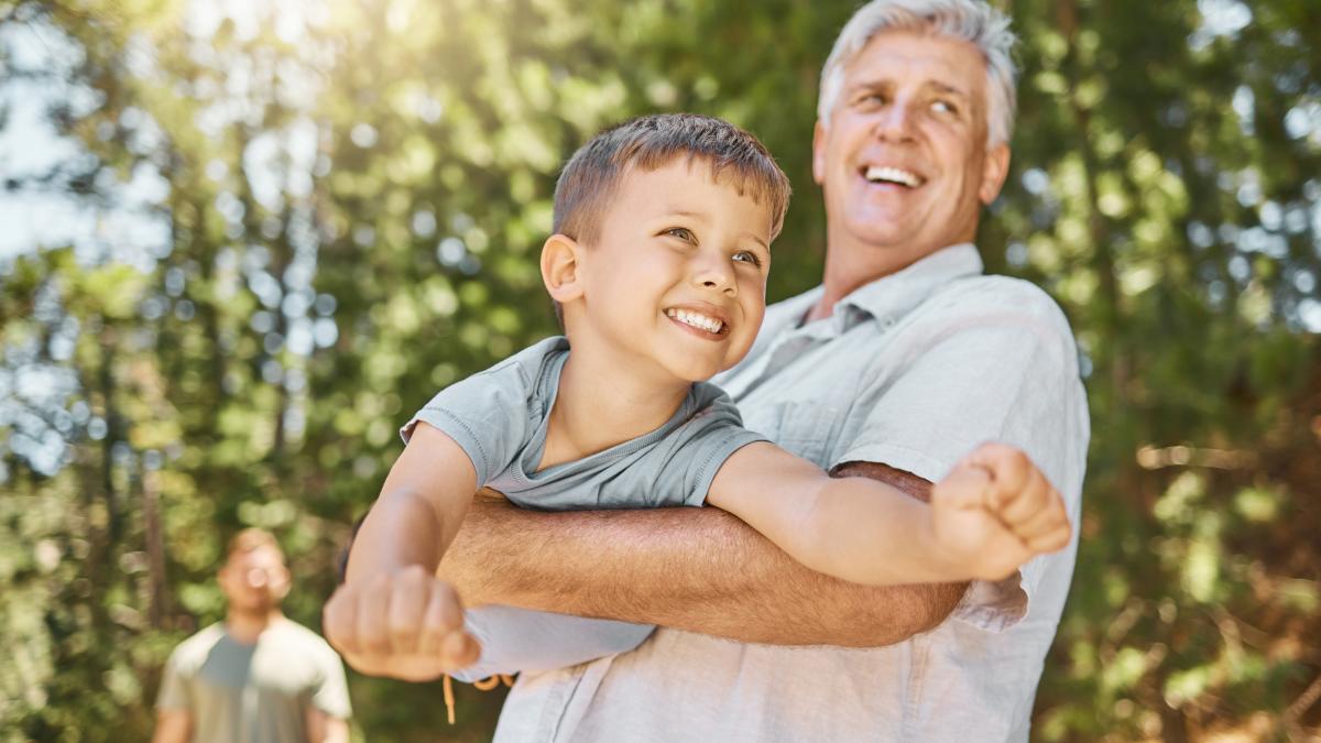 hiking-family-boy-flying-with-his-grandfather-outdoor-nature-while-camping-forest-woods-love-fun-young-male-child-playing-with-his-senior-grandparent-wilderness_42416400