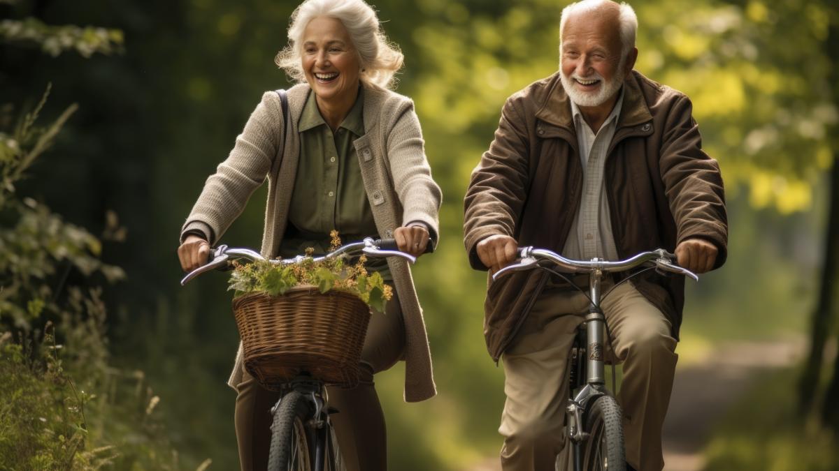 older-couple-riding-their-bikes-together-outdoors_24785700