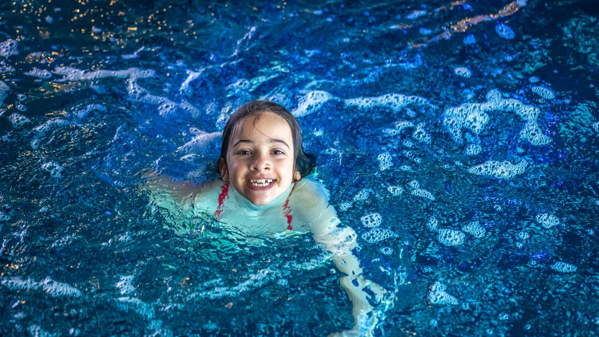 young-teenager-girl-swimsuit-swimming-blue-pool_15481700