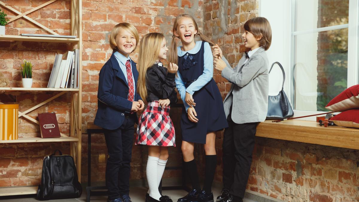 group-kids-spending-time-after-school-together_69248800