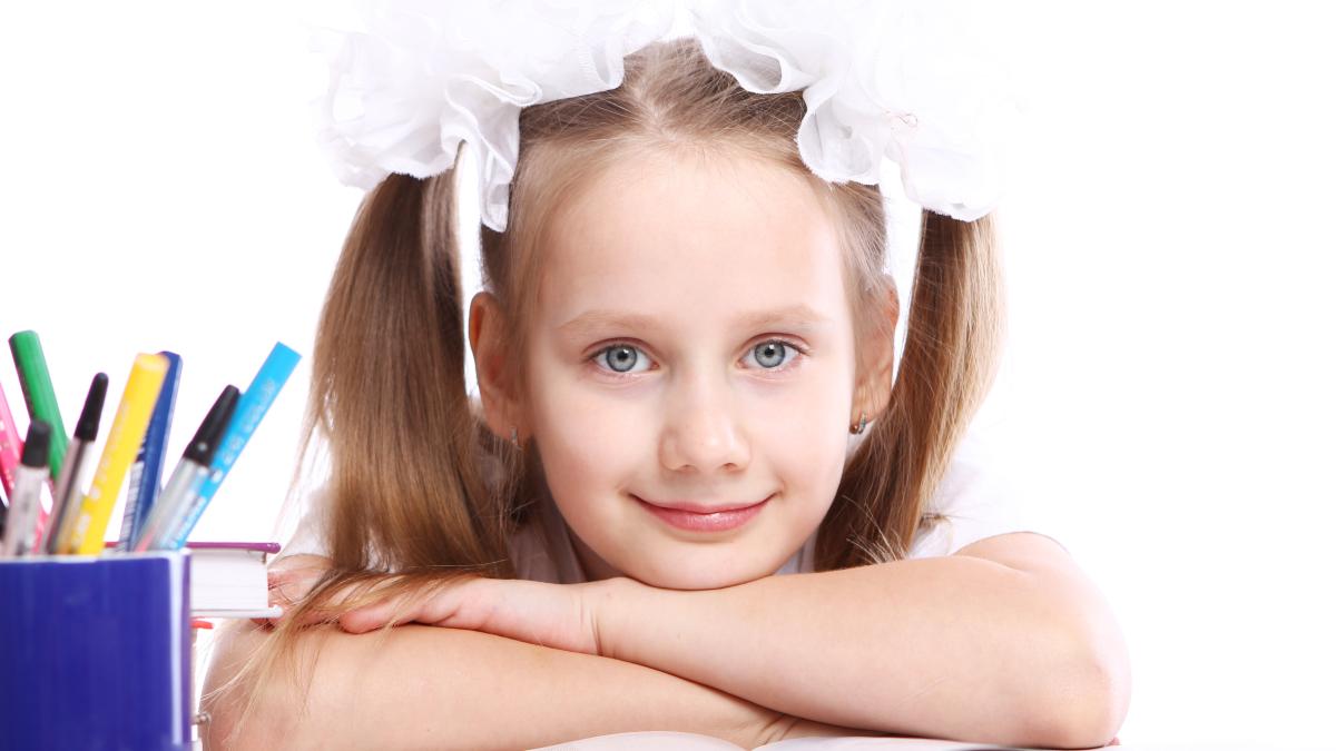 cute-girl-sitting-desk_04532600