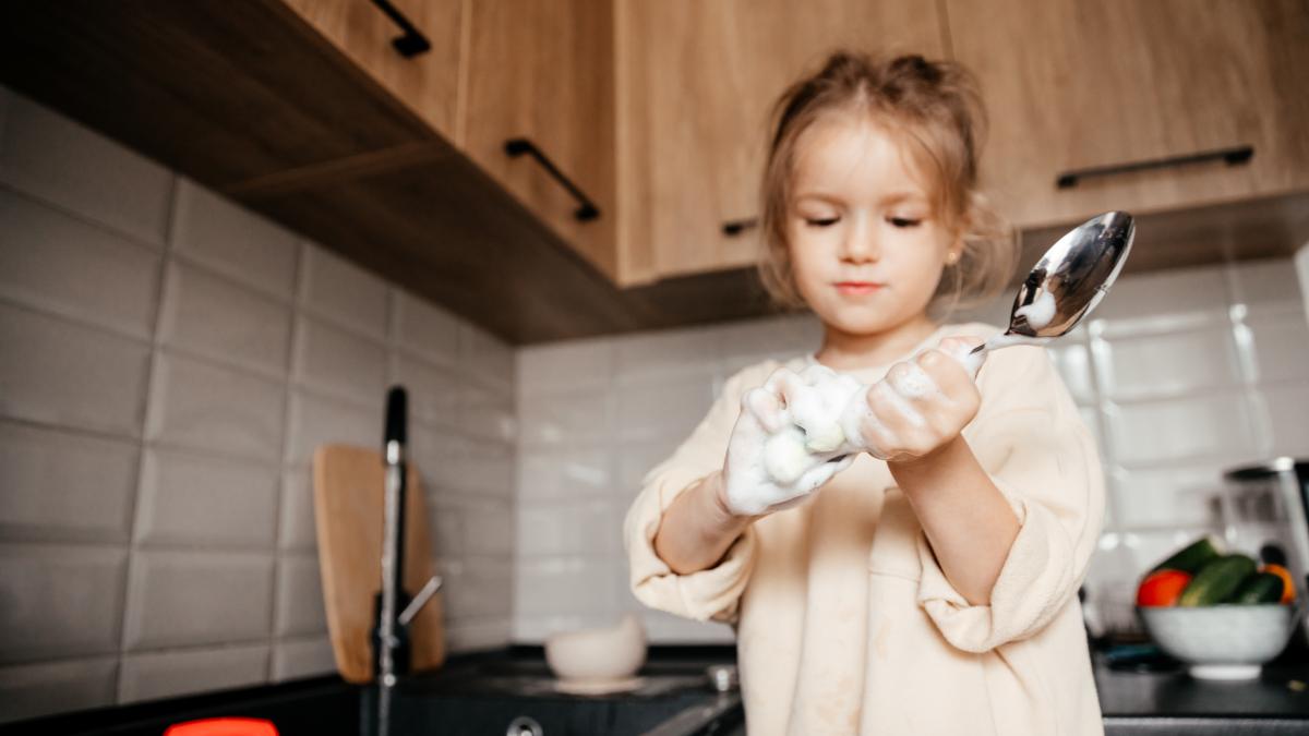caucasian-little-girl-washing-dishes-kitchen-home_67194300