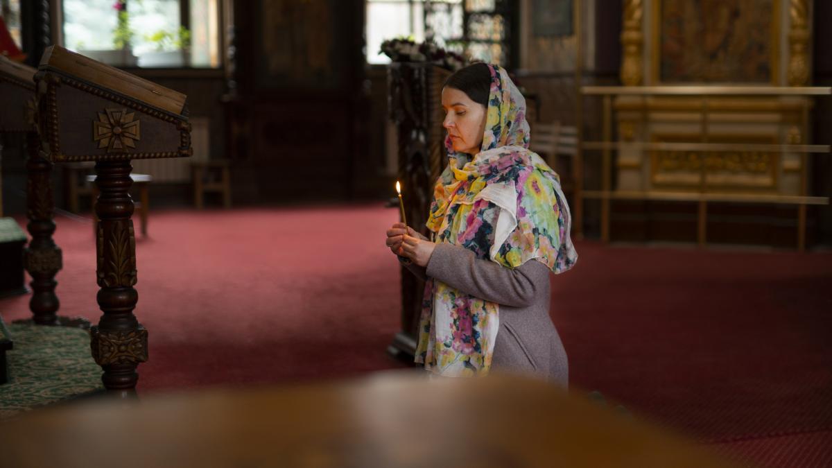 woman-praying-church-religious-pilgrimage_81752000