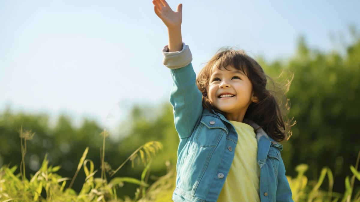 young-girl-field-raising-hand-up_29020800