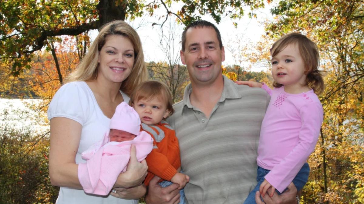 Mamă cu trei copii