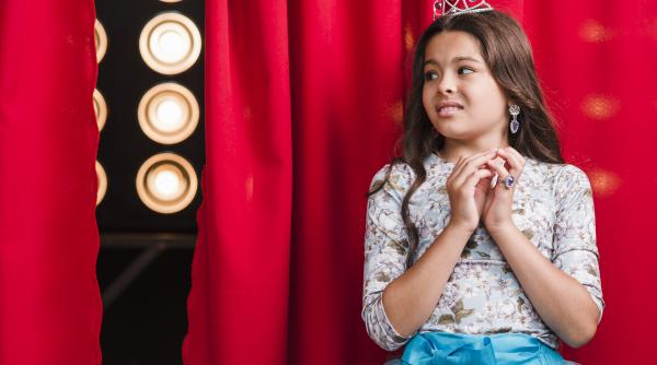 Ce se întâmplă de fapt când copilul tău refuză să participe la serbarea de Crăciun? 